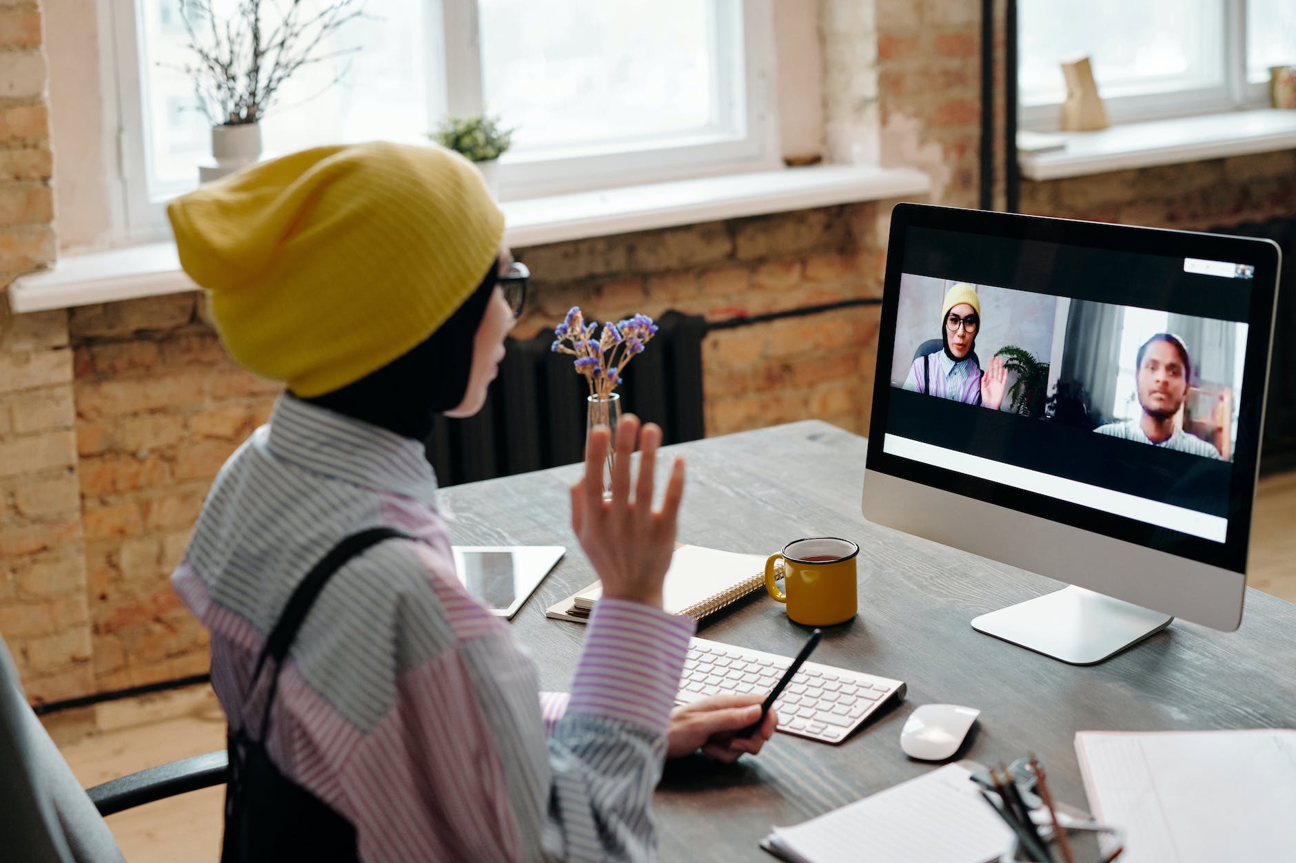 woman talking on video call on computer